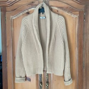 Cardigan style with no buttons. Very good condition.  Only worn a few times.